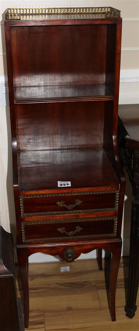 A pair of mahogany bedside cabinets